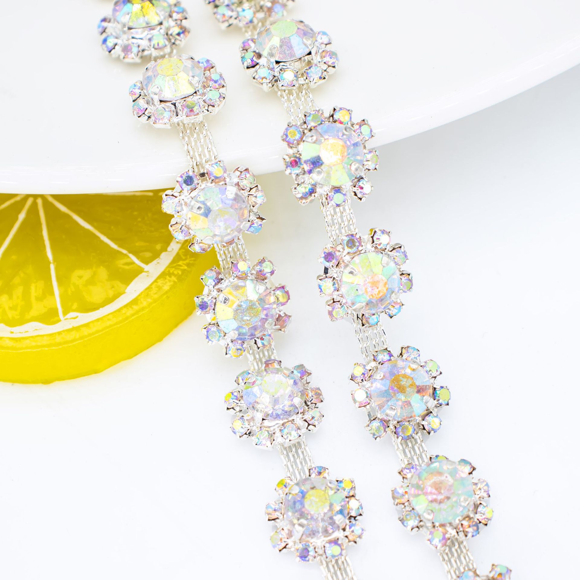 Sunflower Crystal Trim in 10, 13 & 14 mm References — large sunflower/silver AB* width 1.3 / (1 source yard / approximately 90 cm)