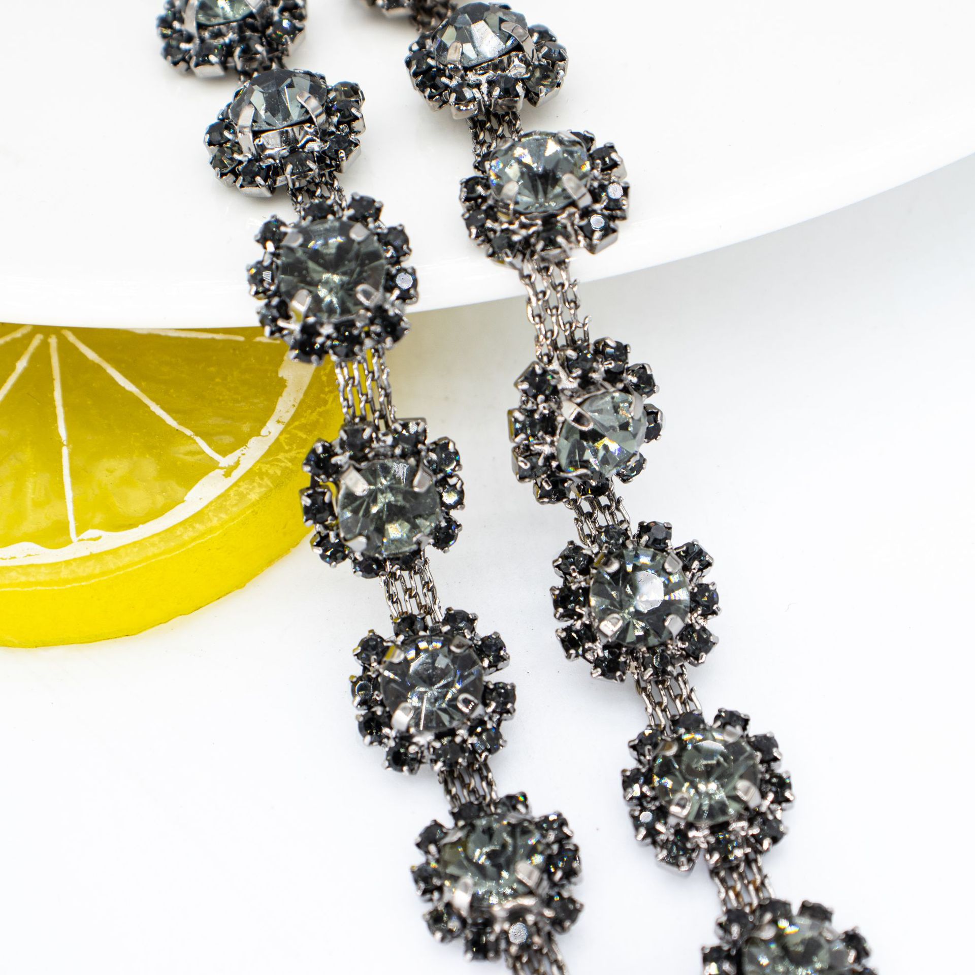 Sunflower Crystal Trim in 10, 13 & 14 mm References — large sunflower/gunmetal gray* width 1.3 / (1 source yard / approximately 90 cm)