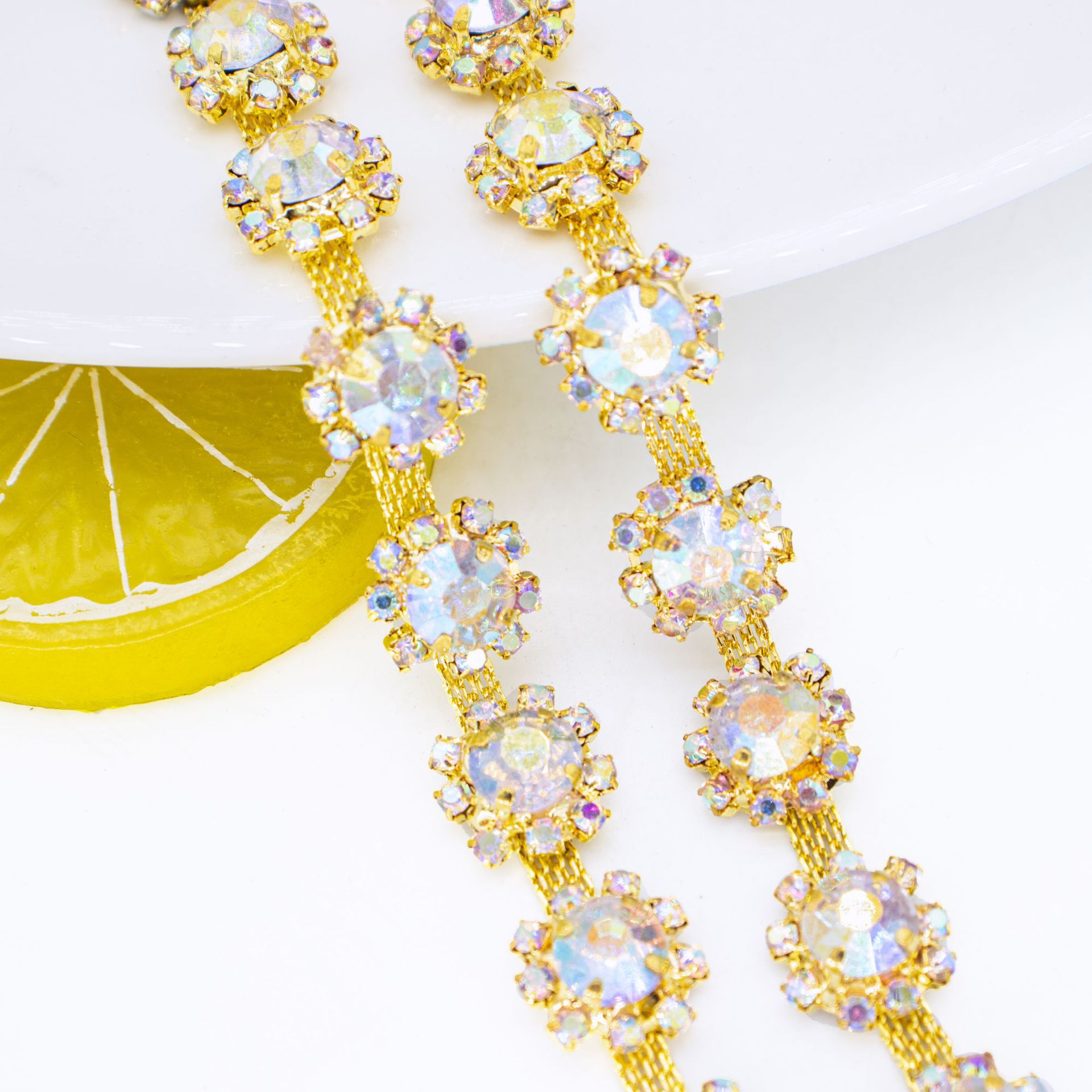 Sunflower Crystal Trim in 10, 13 & 14 mm References — large sunflower/gold AB* width 1.3 / (1 source yard / approximately 90 cm)