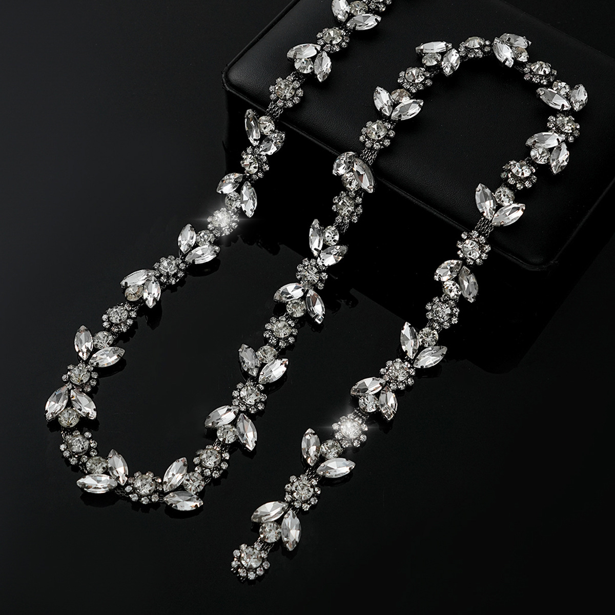Colored Crystal Chain in Sparse & Dense Repeats — dense design-gunmetal base / white rhinestones- width 2.1cm- weight: 120g 1 source yard / 1 source yard / approximately 90 cm long ( source packing: 10 units per roll)