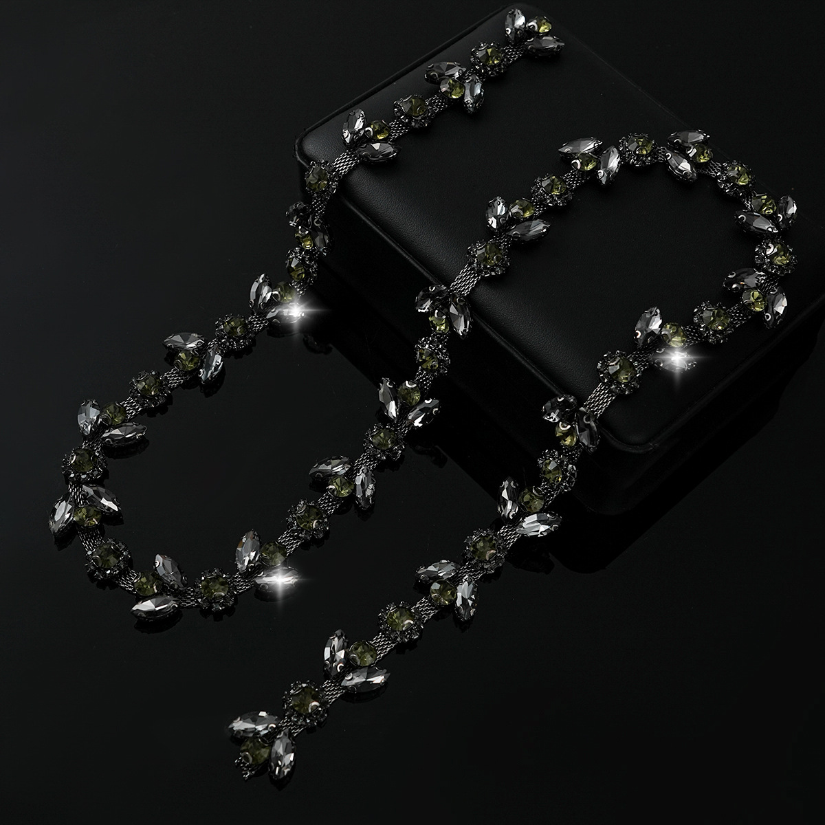 Colored Crystal Chain in Sparse & Dense Repeats — sparse design-gunmetal base / gray rhinestones- width 2.2cm- weight: 100g 1 source yard / 1 source yard / approximately 90 cm long ( source packing: 10 units per roll)