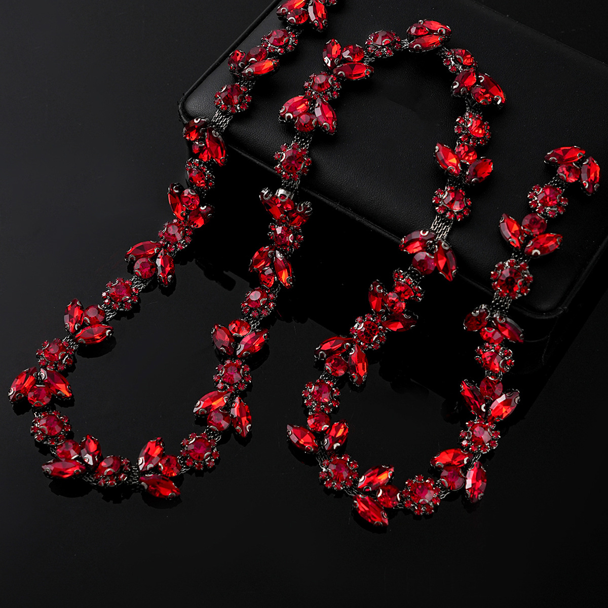 Colored Crystal Chain in Sparse & Dense Repeats — dense design-gunmetal base / red- width 2.1cm- weight: 120g 1 source yard / 1 source yard / approximately 90 cm long ( source packing: 10 units per roll)