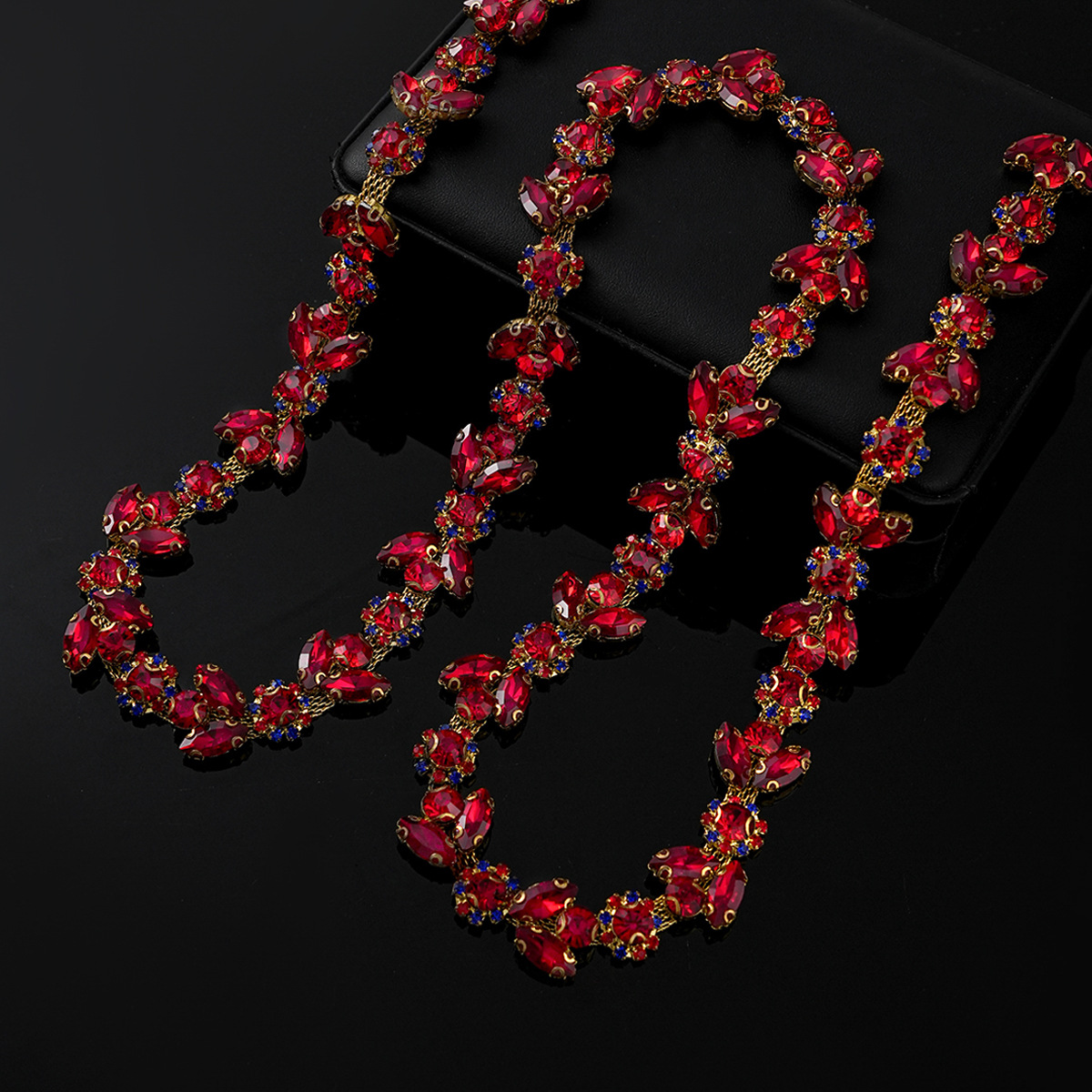 Colored Crystal Chain in Sparse & Dense Repeats — dense design-gold base / red- width 2.1cm- weight: 120g 1 source yard / 1 source yard / approximately 90 cm long ( source packing: 10 units per roll)
